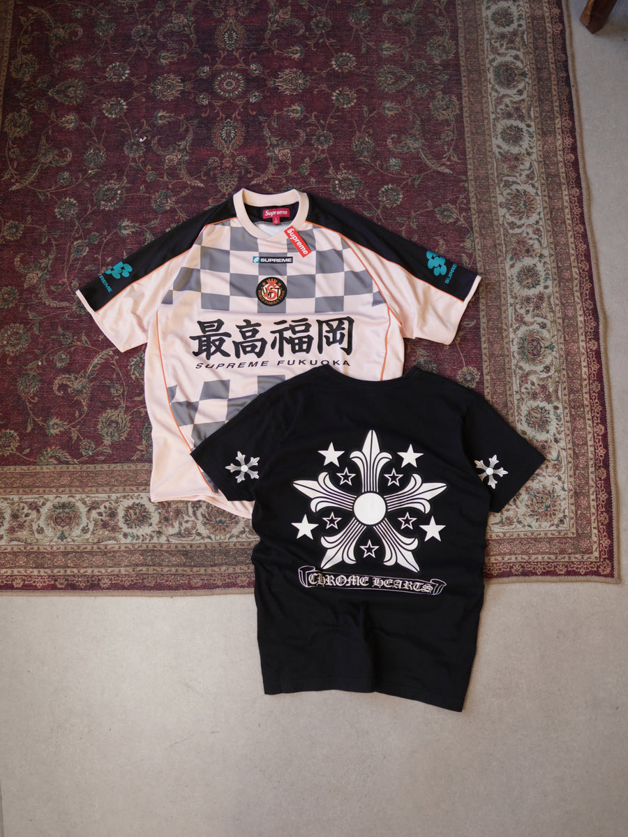 Supreme and Chrome Hearts pieces laid out at the ARCHIVE showroom